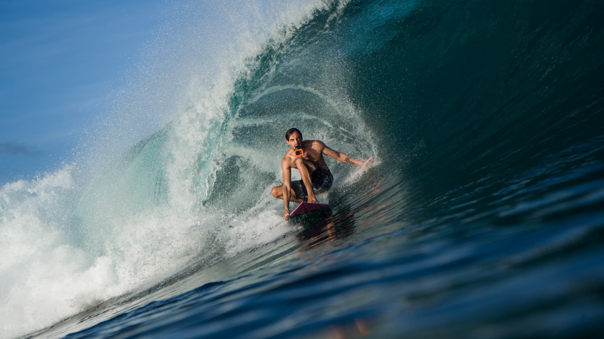 Aidan Dean surfing in the water